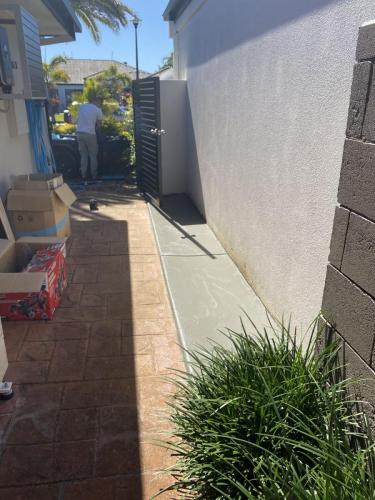 small concreting job along the wall